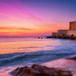 키프로스의 럭셔리 휴양지 - **Prompt:** A captivating sunset scene in Paphos, Cyprus, capturing the ancient charm and romantic a...